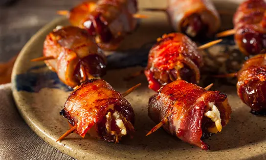 bacon wrapped dates with blue cheese dish from top