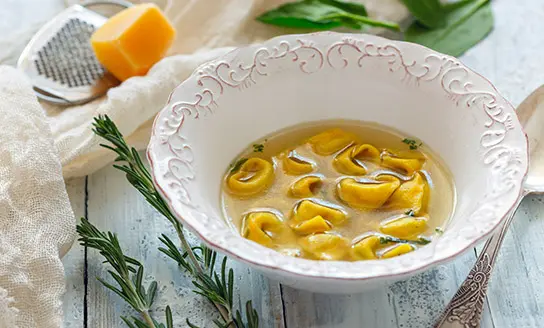 broth tortellini soup dish from top