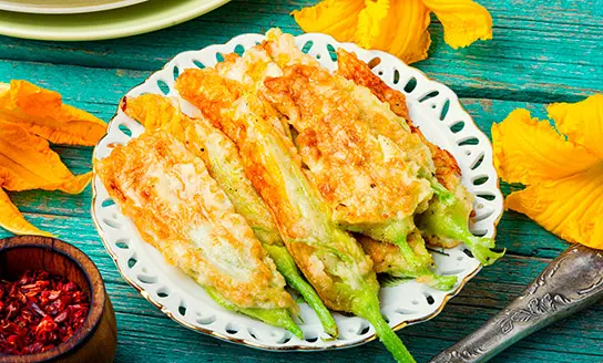 deep fried courgette flowers dish from top